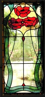 In art nouveau stijl uitgevoerd raam van echt antiek glas